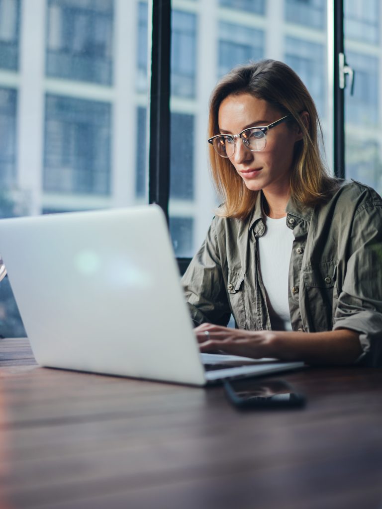 Woman Working On Laptop. Freelancer At Remote Work. Female Student Learning On Line Via Computer. Blogger Or Journalist Writing New Article.